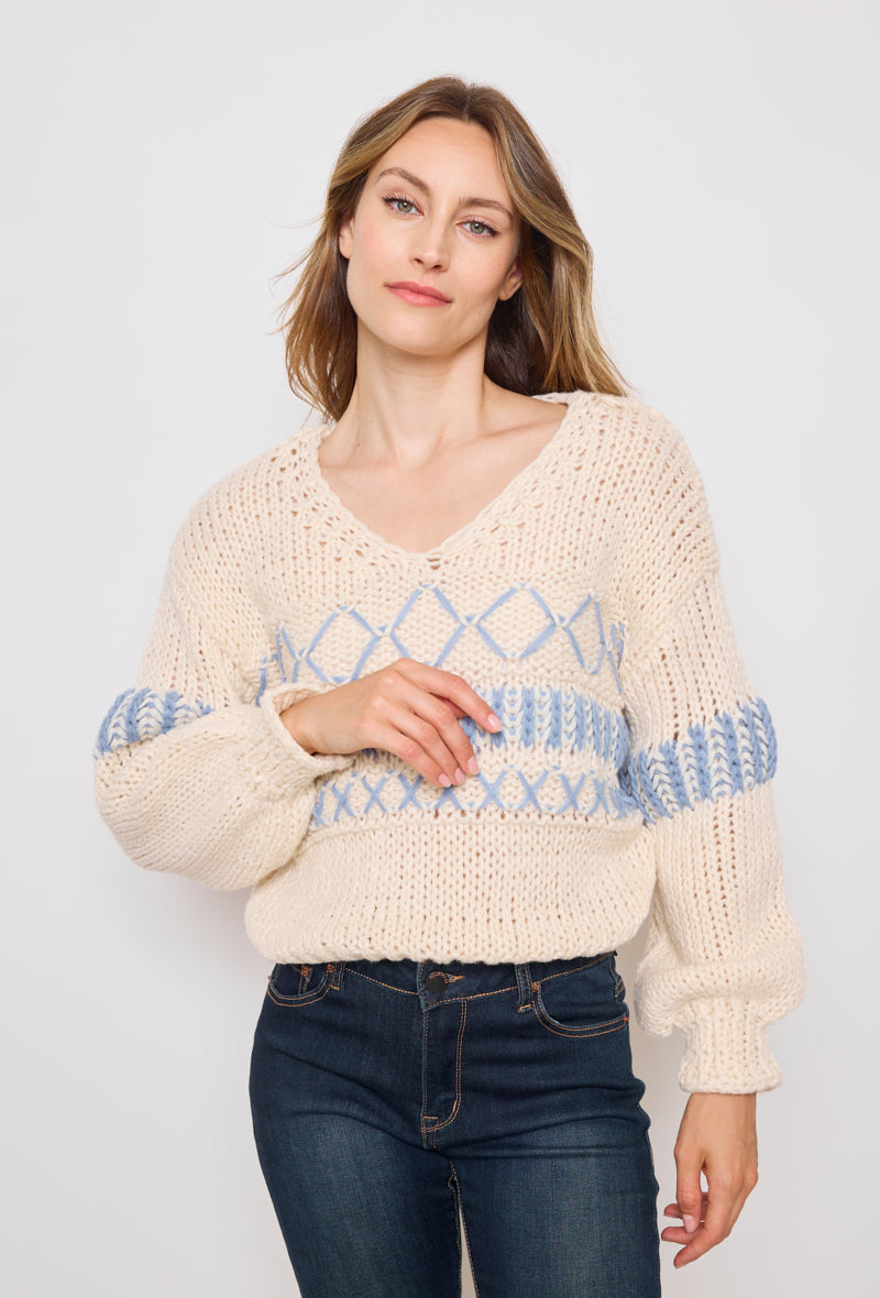 Pull tricot, grosse maille à motifs