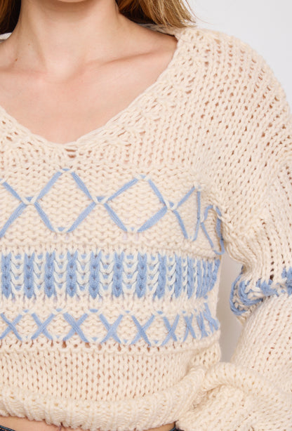 Pull tricot, grosse maille à motifs