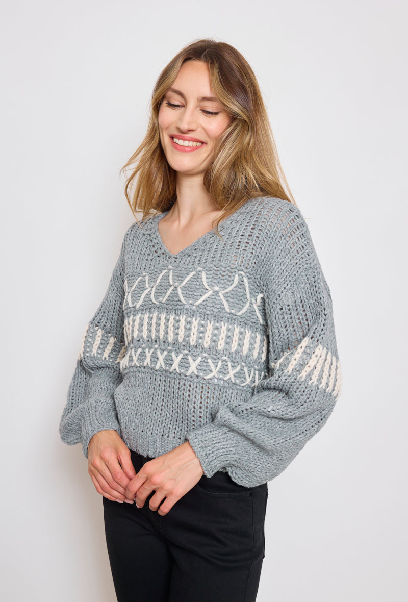 Pull tricot, grosse maille à motifs